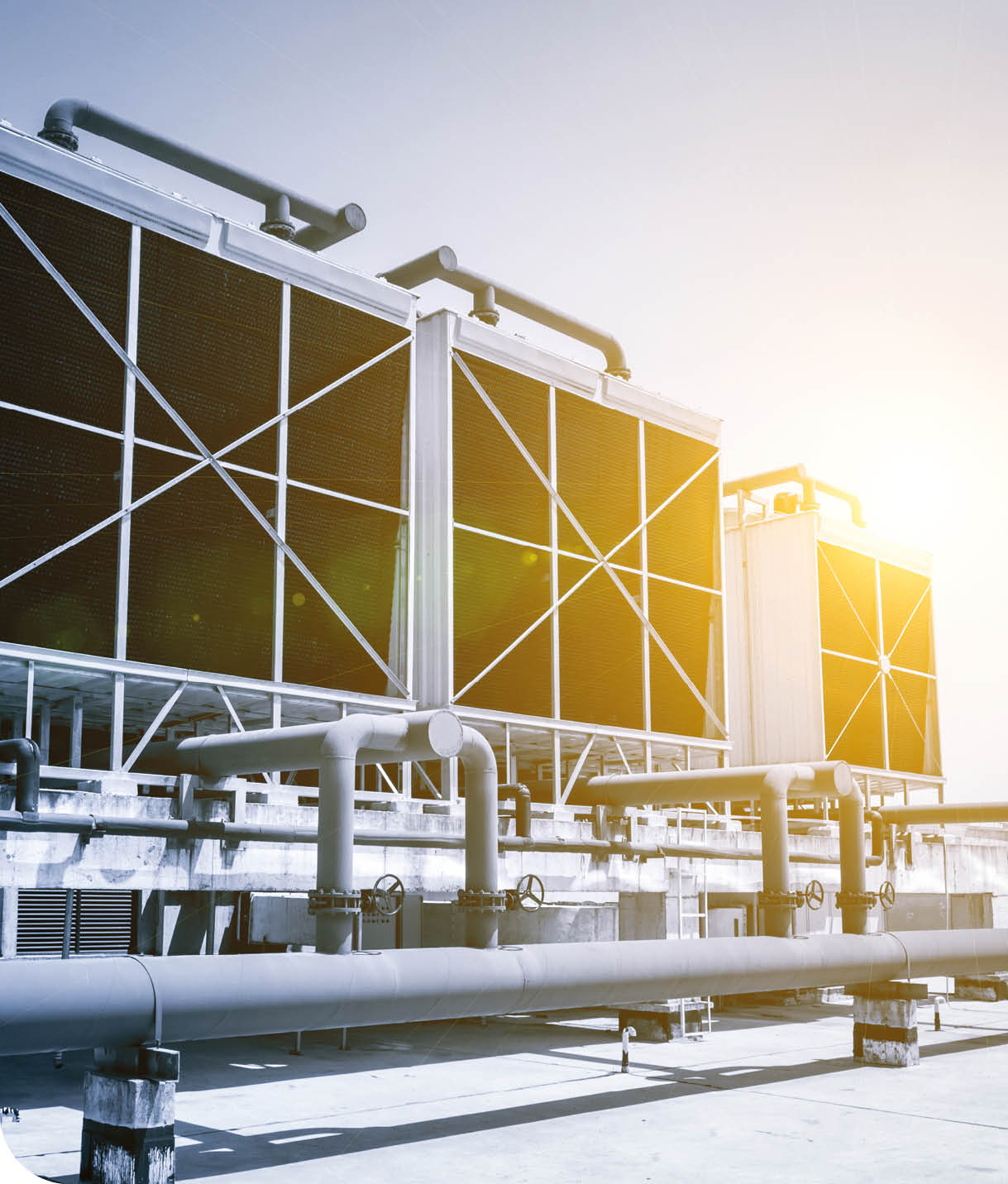 Sets of cooling towers in data center building.