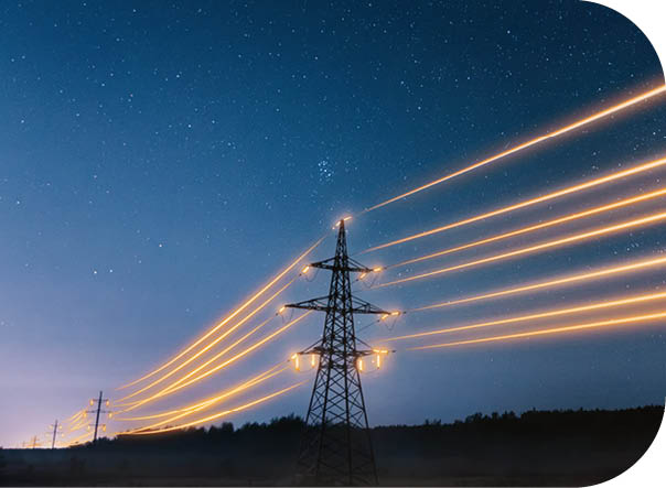 Electricity transmission towers with orange glowing wires the starry night sky. Energy infrastructure concept.